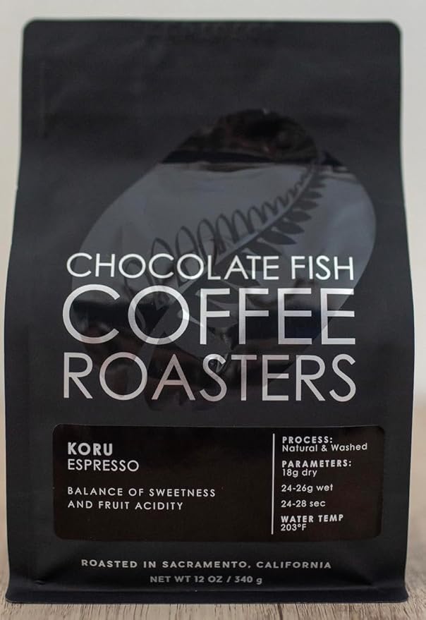 Chocolate Fish Coffee Roasters Koru Espresso Dark Roast Whole Bean Coffee with Caramel and Orange Notes Natural and Washed Process 12 oz