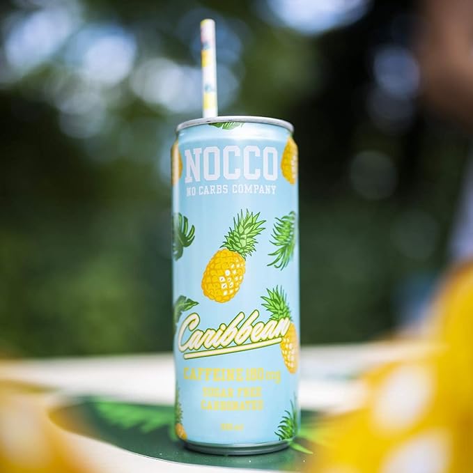 NOCCO BCAA Caribbean 12 x 330ml | Proteinreiches Energy - Getränk ohne Zucker | No Carbs Company | Vitamin- und Koffein-Boost | Kohlensäurehaltige Sportgetränke für Muskelleistung und - regeneration