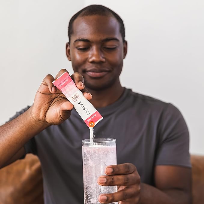 Thrive Premium Collagen Powder Drink - Pink Lemonade - Type I and III Collagen Hyaluronic Acid Biotin Vitamin C (16 Stick Packets Pink Lemonade Infused Caffeine)