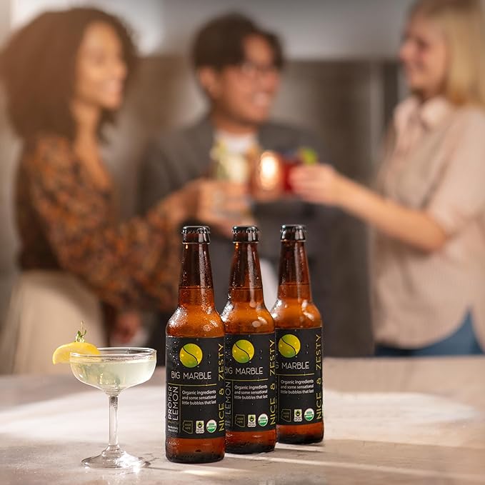 Big Marble Organic Proper Lemon Premium Non-Alcoholic Low Sugar Zesty Citrus Fair Trade Certified Real Lemon No Artificial Sweeteners/Colors for Cocktails &amp Mocktails - 12 Pack 355ml (12 F